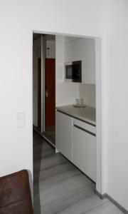 Kuchyň nebo kuchyňský kout v ubytování Apartmány - Frymburk My Family