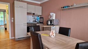 Kuchyň nebo kuchyňský kout v ubytování Zweizimmerwohnung - Ferienwohnung im Sankt Englmar