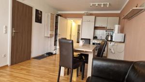 Kuchyň nebo kuchyňský kout v ubytování Zweizimmerwohnung - Ferienwohnung im Sankt Englmar