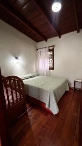 Postel nebo postele na pokoji v ubytování Monte Santo Y Café