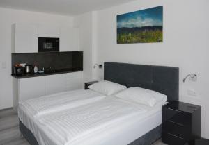 Postel nebo postele na pokoji v ubytování Apartmány - Frymburk My Family