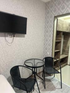 TV a/nebo společenská místnost v ubytování Hotel Skib