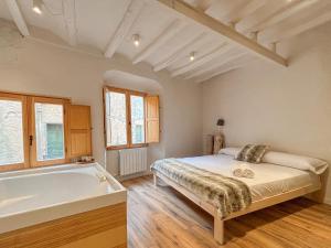 Posteľ alebo postele v izbe v ubytovaní Clauhomes Casa Rural Deluxe