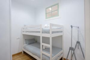 Postel nebo postele na pokoji v ubytování Apartment Gijón - Avda La Costa
