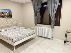 Postel nebo postele na pokoji v ubytování AFFITTACAMERE Self check-in Francesca Vecchia