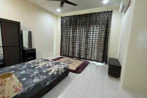 a bedroom with a bed and a large window at Homestay Bagan Serai in Bagan Serai
