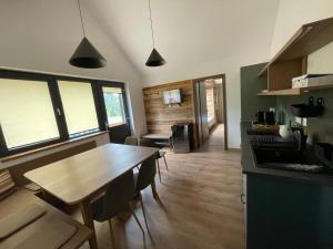 Kuchyň nebo kuchyňský kout v ubytování Kaliba Cabins