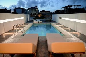 Bazén v ubytování Melior Luxury Villas nebo v jeho okolí