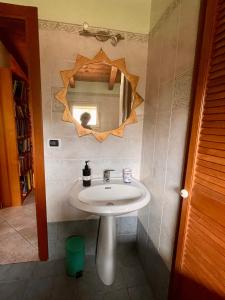 a bathroom with a sink and a mirror at La Beata Giovanna in Mesagne +51 photos