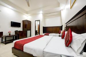 Postel nebo postele na pokoji v ubytování Hotel Legend International - 02 Mins from New Delhi Station