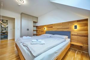 Posteľ alebo postele v izbe v ubytovaní Apartment Katschbergblick 7