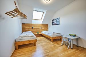 Posteľ alebo postele v izbe v ubytovaní Apartment Katschbergblick 7