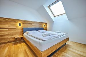 Posteľ alebo postele v izbe v ubytovaní Apartment Katschbergblick 7