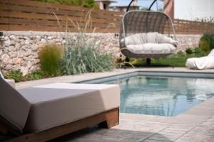 Bazén v ubytování Melior Luxury Villas nebo v jeho okolí