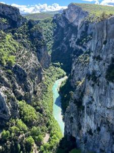 a view of a river in a canyon at Mobil Home proche du lac Ste Croix et Gorges du Verdon in Sainte-Croix-de-Verdon
