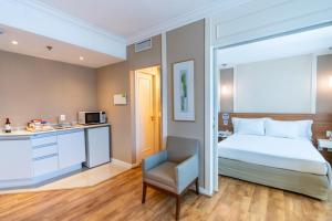 Cama ou camas em um quarto em Intercity The Universe Paulista