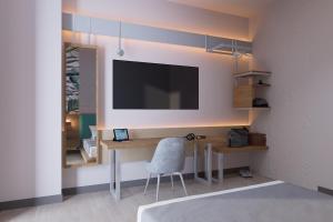 TV a/nebo společenská místnost v ubytování Smart Hotel