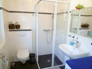 Ein Badezimmer in der Unterkunft Kapitänsresidenz - Haus direkt am Wasser