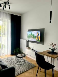 Et tv og/eller underholdning på DS Apartamenty Jaśminowa