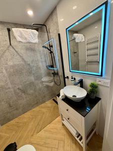 Et badeværelse på DS Apartamenty Jaśminowa