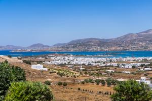 a view of the town of akrotiri and the ocean at Lagadia Village in Antiparos