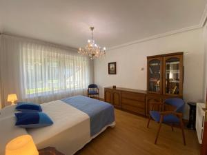 Ένα ή περισσότερα κρεβάτια σε δωμάτιο στο Villa Sarin