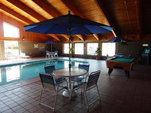 The swimming pool at or close to AmericInn by Wyndham Sturgeon Bay