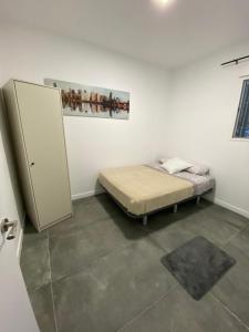 Postel nebo postele na pokoji v ubytování Valencia Ayora