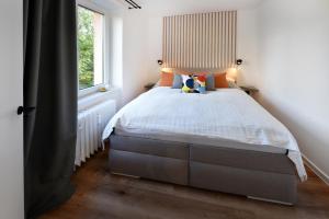 Postel nebo postele na pokoji v ubytování Apartmán KUVIK