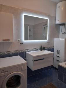 Kúpeľňa v ubytovaní Apartments Proto