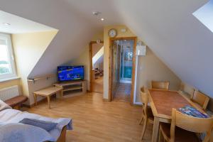 TV a/nebo společenská místnost v ubytování The Tides Ballybunion