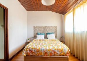 Кровать или кровати в номере Terraço da Boavista
