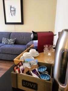 a box on a coffee table in a living room at La Dimora dell'Arte in Bari