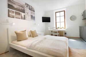 Postel nebo postele na pokoji v ubytování Apartmenthaus ROSE