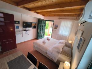 Postel nebo postele na pokoji v ubytování Apartment Leonarda