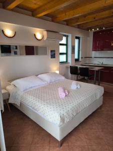 Postel nebo postele na pokoji v ubytování Apartment Leonarda