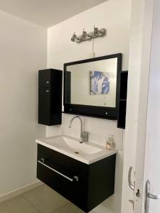 Koupelna v ubytování Villa Outuorau