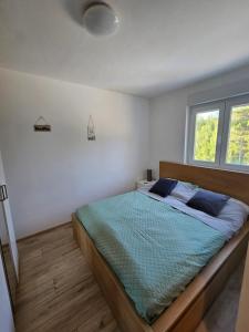 Postel nebo postele na pokoji v ubytování Villa Torovi - pool oasis + 43 fotografií