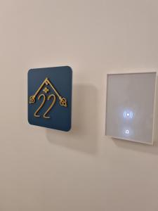a sign with the number two on a wall at Casa LoRè in Torre Annunziata