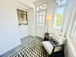 En eller flere senge i et værelse på Pelso- Villa- luxury apartment