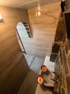 a bathroom with a tub and a sink in a room at Perla garden suit in Çamlıhemşin +41 photos