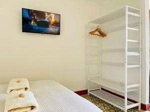 Postel nebo postele na pokoji v ubytování La Cachette de Camille - Vue Mer + 18 fotografií