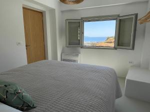 Letto o letti in una camera di Solo Sole Suites Santorini