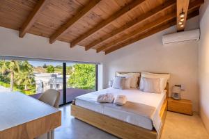 Posteľ alebo postele v izbe v ubytovaní Kallithea Village hotel + 37 fotografií