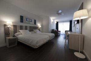 Cama o camas de una habitación en Hotel La Palma de Llanes