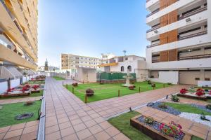 a view of the courtyard of a building at BeachSide Maspalomas FKK friendly in Maspalomas