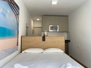 Posteľ alebo postele v izbe v ubytovaní Livemálaga Malagueta