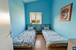 Voodi või voodid majutusasutuse Apartman Iva toas