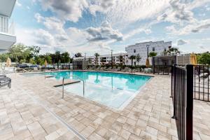 a swimming pool at a resort with at 2 Mi to UF Campus! Dog-Friendly Condo w/ Pool in West Hills