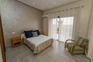 Postel nebo postele na pokoji v ubytování Luxueuse Exclusive Villa 4 suites + 20 fotografií